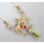 An Edwardian 15ct, peridot, seed pearl and ruby set drop pendant necklace, 46cm, gross weight 6.9