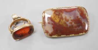 A Victorian yellow metal overlaid seal and and intaglio carnelian set seal, 21mm and a yellow