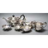 Small silver including tea pot, cream and sugar, two sauceboats and a pair of small dishes, 29.9oz.