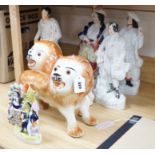 A group of 19th century Staffordshire flat backs and a pair of late Staffordshire pottery lions,