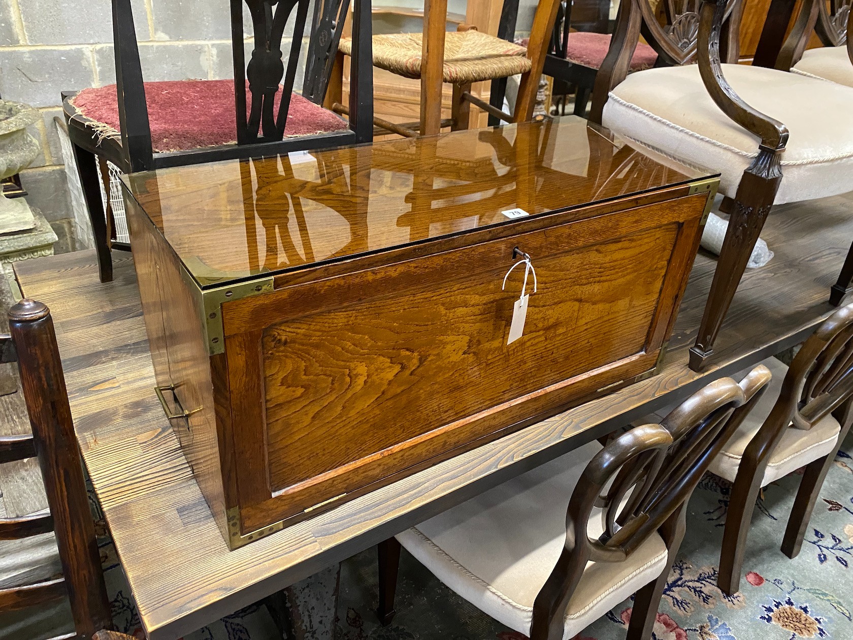 A 19th century military style brass mounted oak fall fronted writing cabinet, width 84cm, depth