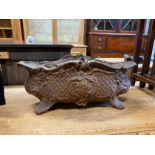 An oval cast iron garden planter, width 48cm, depth 20cm, height 21cm