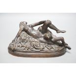 A 20th century erotic and demonic bronze figure group, 20cm long