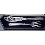 A cased pair of Victorian silver fish servers, Martin, Hall & Co, Sheffield, 1857, knife 31.2,
