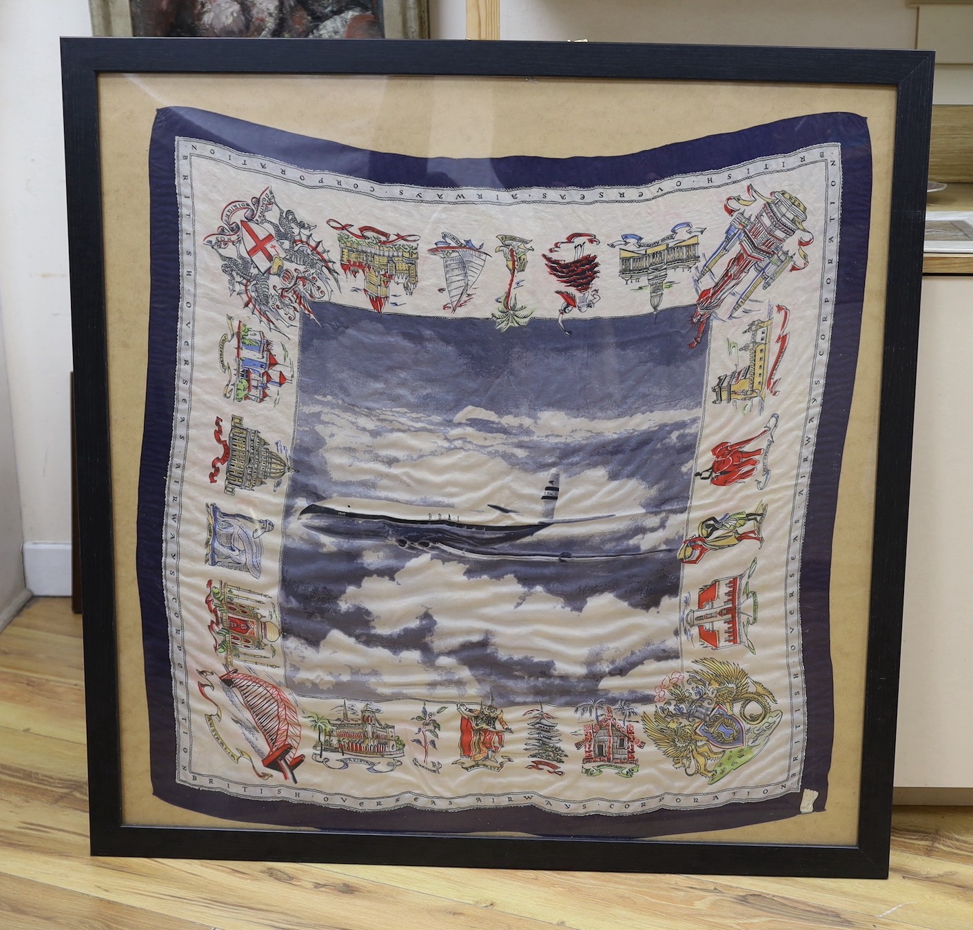 A hand coloured BOAC scarf, framed