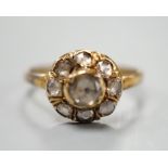 An antique yellow metal and rose cut diamond cluster set ring, size K/L, gross weight 3.2 grams.