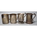 Four assorted silver mugs, including engraved George III, London, 1769, 94mm and a pair by