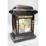 An ebonised bracket clock, 40cm