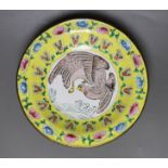 A Chinese Guangzhou enamel 'eagle' dish, 19cm