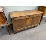 An early 18th century oak triple panelled coffer, length 110cm, depth 42cm, height 68cm