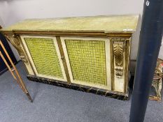 A Regency style cream and giltwood two door cupboard, with a faux green marble top, width 185cm,