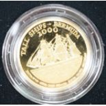 A cased Tall Ships Bermuda 2000 Race of the Century Commemorative gold proof $15 coin, with