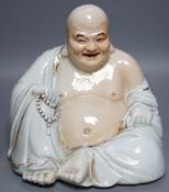 A large Chinese porcelain figure of Budai, Republic period, 25cms high