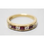 A modern 18ct gold and channel set four stone diamond and three stone ruby set half hoop ring,