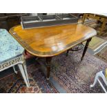A Regency mahogany and rosewood banded gateleg dining table, width 122cm extended, depth 145cm,