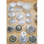 Fifteen toothpaste and gentleman’s relish pot lids and two pot bases,