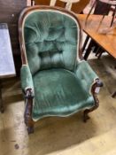 A Victorian rosewood upholstered spoonback armchair, width 69cm, depth 70cm, height 91cm