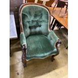 A Victorian rosewood upholstered spoonback armchair, width 69cm, depth 70cm, height 91cm