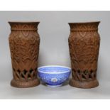 A pair of Indian carved wood vases, 22.5cm high, and a Persian blue enamel bowl (3)