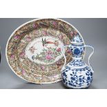A Chinese blue and white jar, cover and a famille rose dish, dish length 35cm