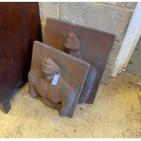 A pair of cast stone abstract portrait relief wall plaques, initialled M J E, larger width 48cm,