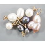 Seven assorted modern yellow metal mounted cultured pearl pendants and a similar white metal mounted