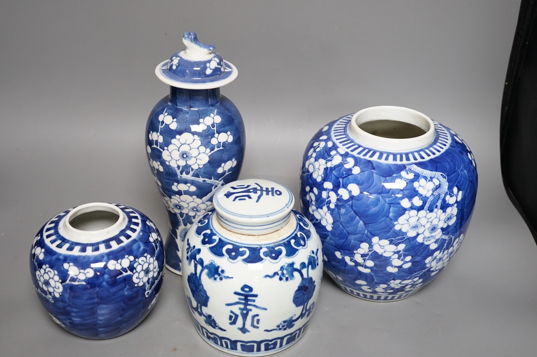 Two Chinese prunus jars, a vase and cover and a a jar and cover, vase and cover 26 cms high - Image 2 of 7