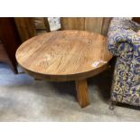 A contemporary circular oak coffee table, diameter 100cm, height 49cm