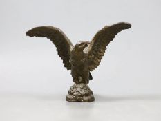 A bronze figure of an eagle with wings spread, 10cm high