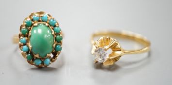 Two 750 yellow metal and gem set rings, turquoise cluster and simulated diamond, gross weight 7.4