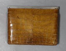 A silver mounted folding crocodile clutch bag, London 1927, 16 x 20cm