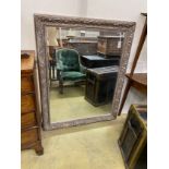 An Art Nouveau style rectangular silvered wall mirror, width 107cm, height 137cm