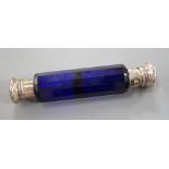A late Victorian white metal mounted blue glass double ended scent bottle, 13.5cm.