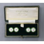 A pair of yellow metal (stamped 18), enamel, mother of pearl and split pearl set disc cufflinks,