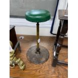 A vintage industrial metal stool, height 57cm