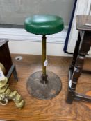 A vintage industrial metal stool, height 57cm