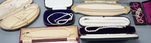 Six assorted single strand graduated cultured pearl necklaces, with marcasite or paste set clasps,