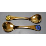 A Georg Jensen gilt sterling 1972 'Cornflower' spoon, 14.9cm and a similar Georg Jensen 1973