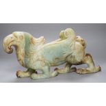 A large Chinese bowenite jade figure of a winged mythical beast, 46cm long