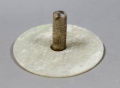 A Chinese archaistic white and black jade cylinder bead, 5.8 cm, boxed and a Chinese archaistic jade