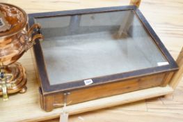 A wooden glazed display case, 62 cm wide