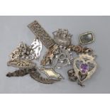 Eight assorted Victorian and later silver brooches, including part yellow metal and one heart