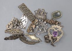 Eight assorted Victorian and later silver brooches, including part yellow metal and one heart