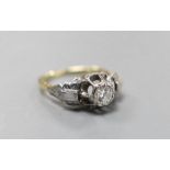 An 18ct, plat and solitaire diamond ring, size M/N, gross weight 3.8 grams, the stone weighing