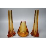 Whitefriars glass - a pair of amber coloured vases and another, 23.5cm