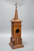 A Victorian mahogany model clock Tower watch holder with removable top and side drawer Height 54 cm