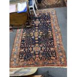 An antique Malaya rug, 210 x 148cm