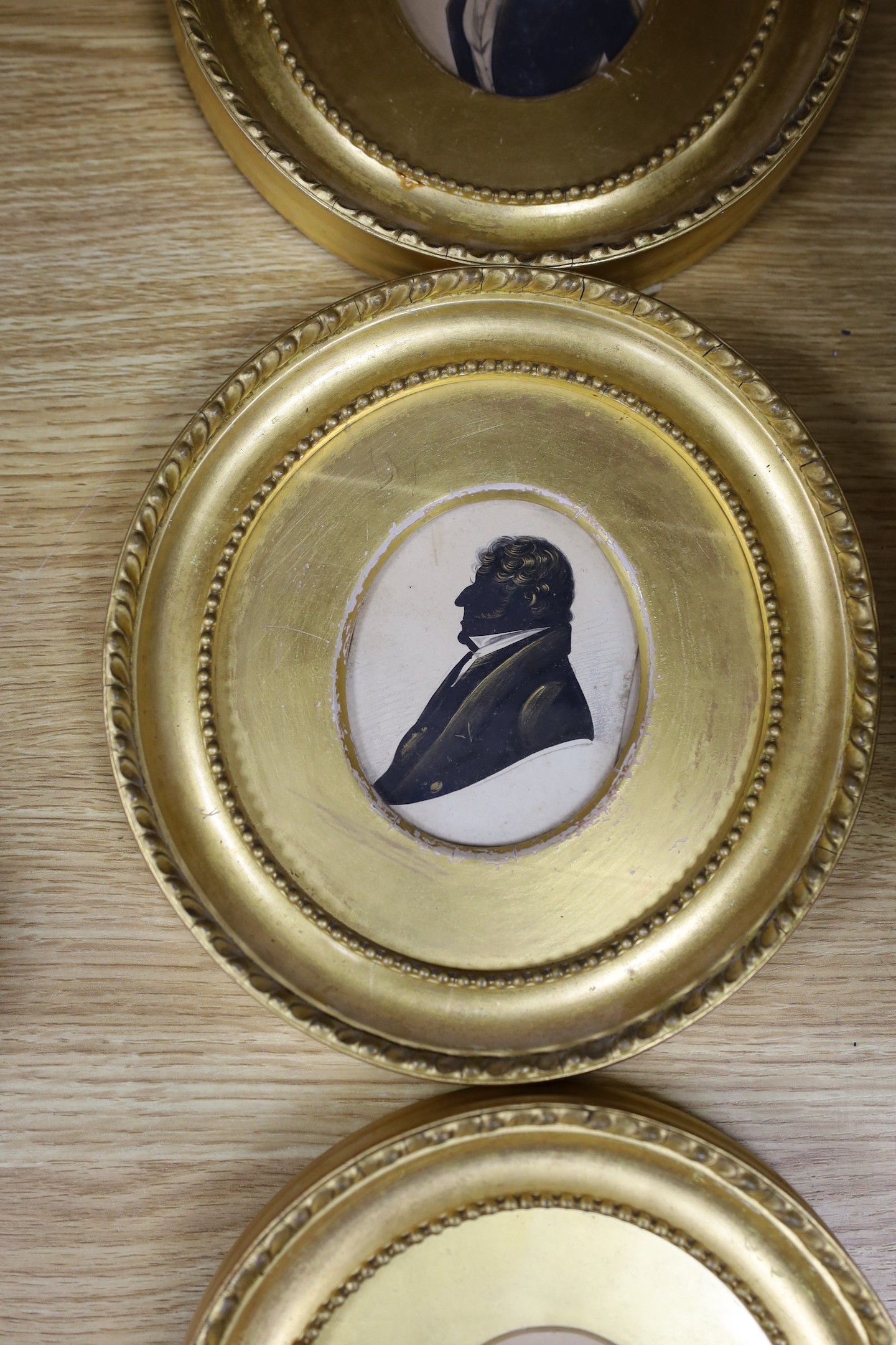 Victorian School, cut paper heightened with bronze, Silhouette of a gentleman, 8 x 6.5cm, with two - Image 3 of 4