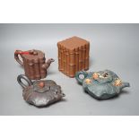 Three Chinese Yixing teapots and a tea caddy