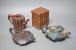Three Chinese Yixing teapots and a tea caddy